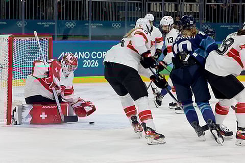 Andrea Braendli blocks a shot against Team Finland