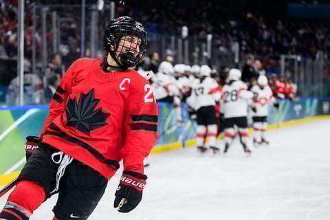 Marie-Philip Poulin in action against Switzerland