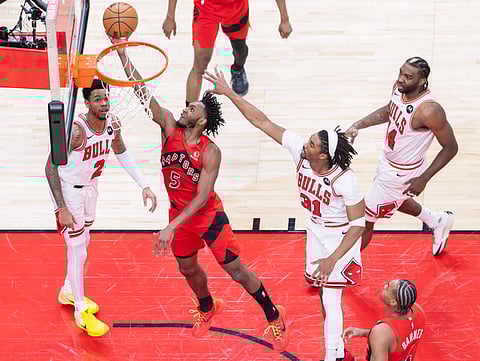 Toronto Raptors and Chicago Bulls players in action 