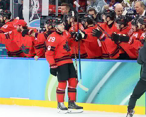 Nathan MacKinnon celebrates his goal against Finland