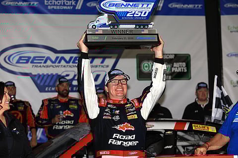 Sheldon Creed celebrates with the trophy 