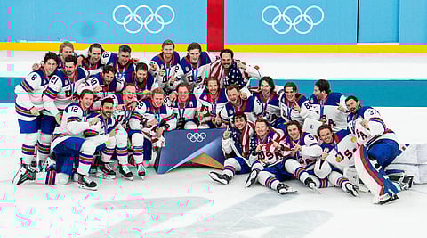 Team USA poses after receiving the Gold Medal