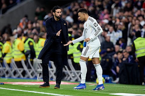 Alvaro Arbeloa with Kylian Mbappe