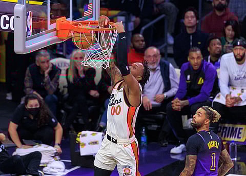 Ron Holland of Detroit Pistons dunks the ball
