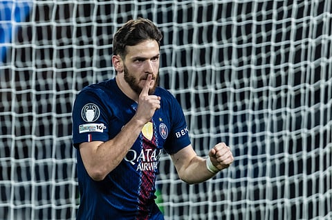 Khvicha Kvaratskhelia celebrates his goal against AS Monaco