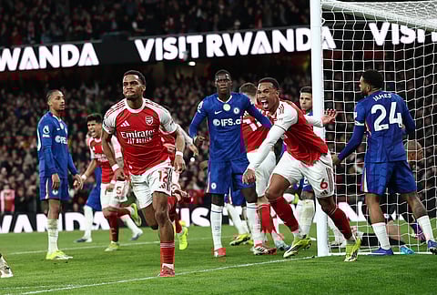 Jurrien Timber celebrates after scoring the winning goal for Arsenal