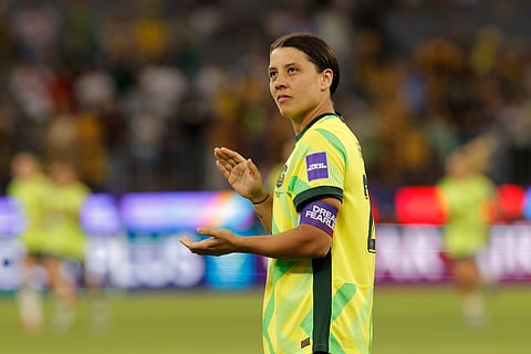 Sam Kerr celebrates after winning against Philippines