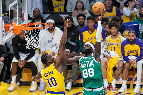Neemias Queta of Boston Celtics goes for a lay-up