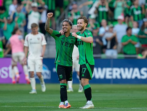 Austin FC players celebrate their win over D.C. United 