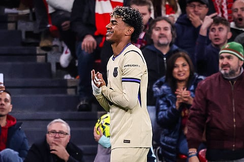 Lamine Yamal celebrates after scoring the winning goal for Barcelona