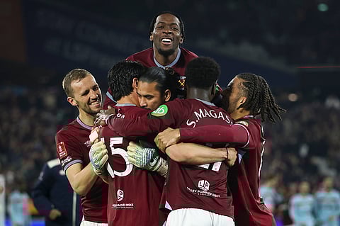 West Ham United players celebrate as they advance to the final eight of FA Cup