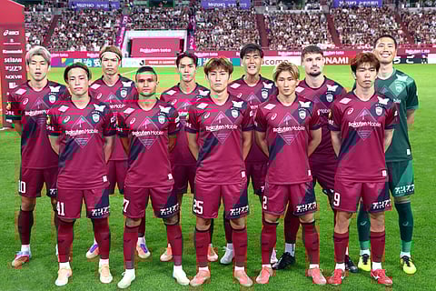 Vissel Kobe players pose for a team photo