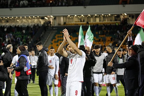Mehdi Taremi applauds the fans during the World Cup qualifiers