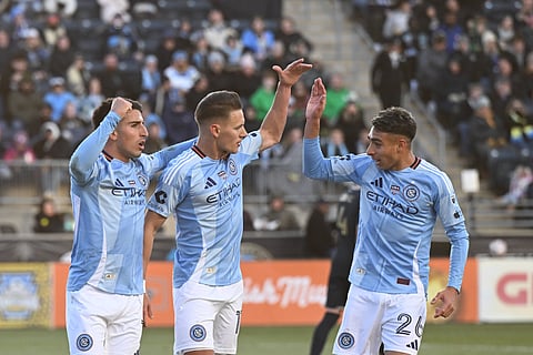 New York City FC players celebrate a goal 