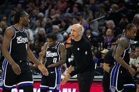 Precious Achiuwa with head coach Doug Christie