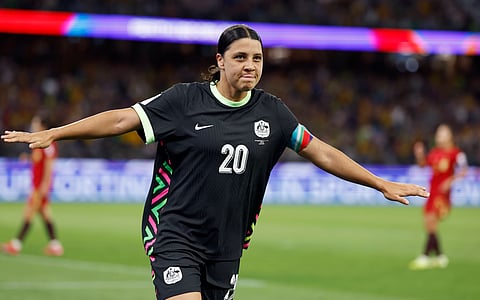 Sam Kerr celebrates her goal against China