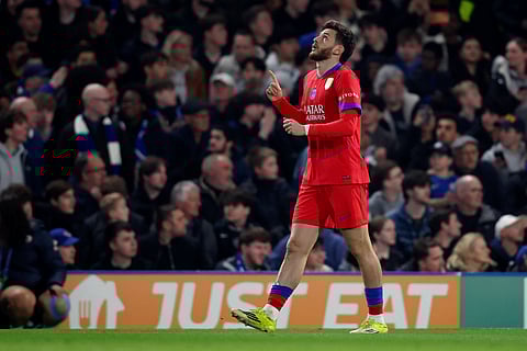 Khvicha Kvaratskhelia celebrates his goal against Chelsea