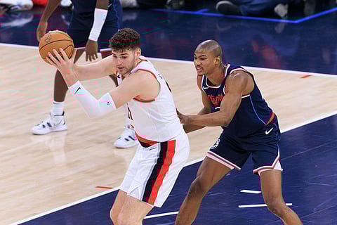 Donovan Clingan of  Portland Trail Blazers with the ball 