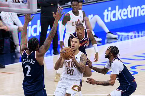 Jaylon Tyson goes for a layup