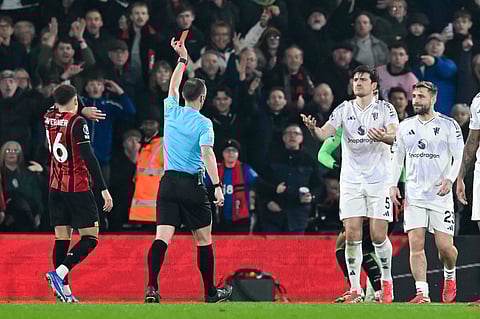 Harry Maguire sees red card afterpulling down Evanilson inside the box