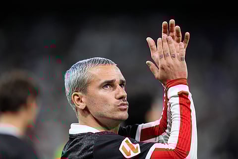 Antoine Griezmann greets the Atletico Madrid fans