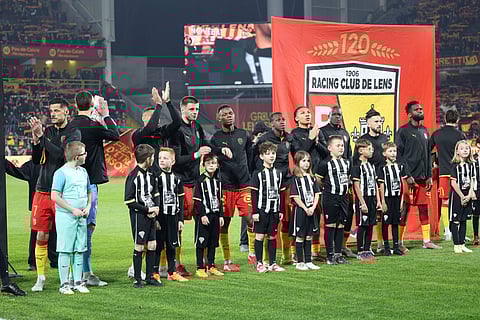 RC Lens players lined up before kick-off