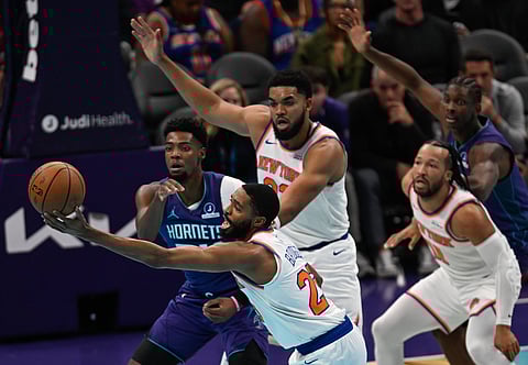 Charlotte Hornets and New York Knicks players in action