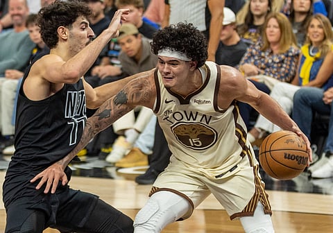 Gui Santos in action against Brooklyn Nets