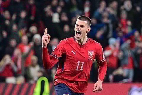 Jan Kliment celebrates after scoring the winning penalty for Czech Republic