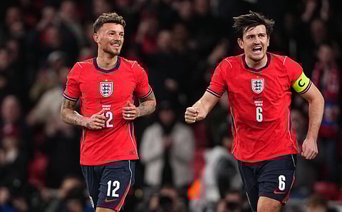 Ben White celebrates his goal with Harry Maguire