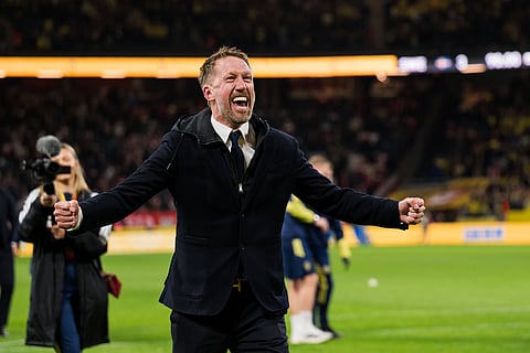 Graham Potter celebrates as Sweden advance to the World Cup 