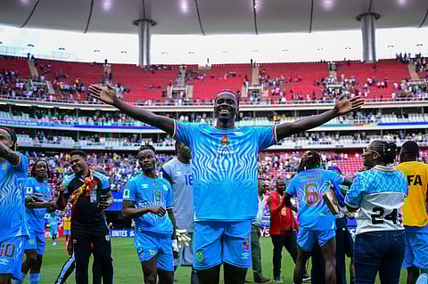 Axel Tuanzebe celebrates qualifying for the World Cup