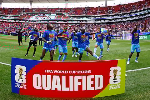 DR Congo players celebrate after beating Jamaica in the play-off final 