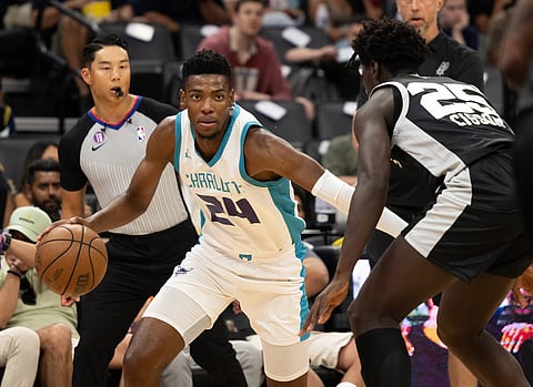 Charlotte Hornets swingman Brandon Miller with the ball