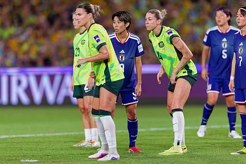 Japan and Australia players in action during the Women's Asian Cup final