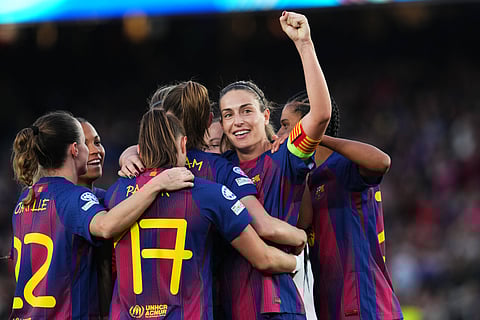 Alexia Putellas celebrates her goal with teammates