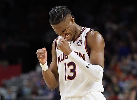 Auburn Tigers guard Miles Kelly celebrates