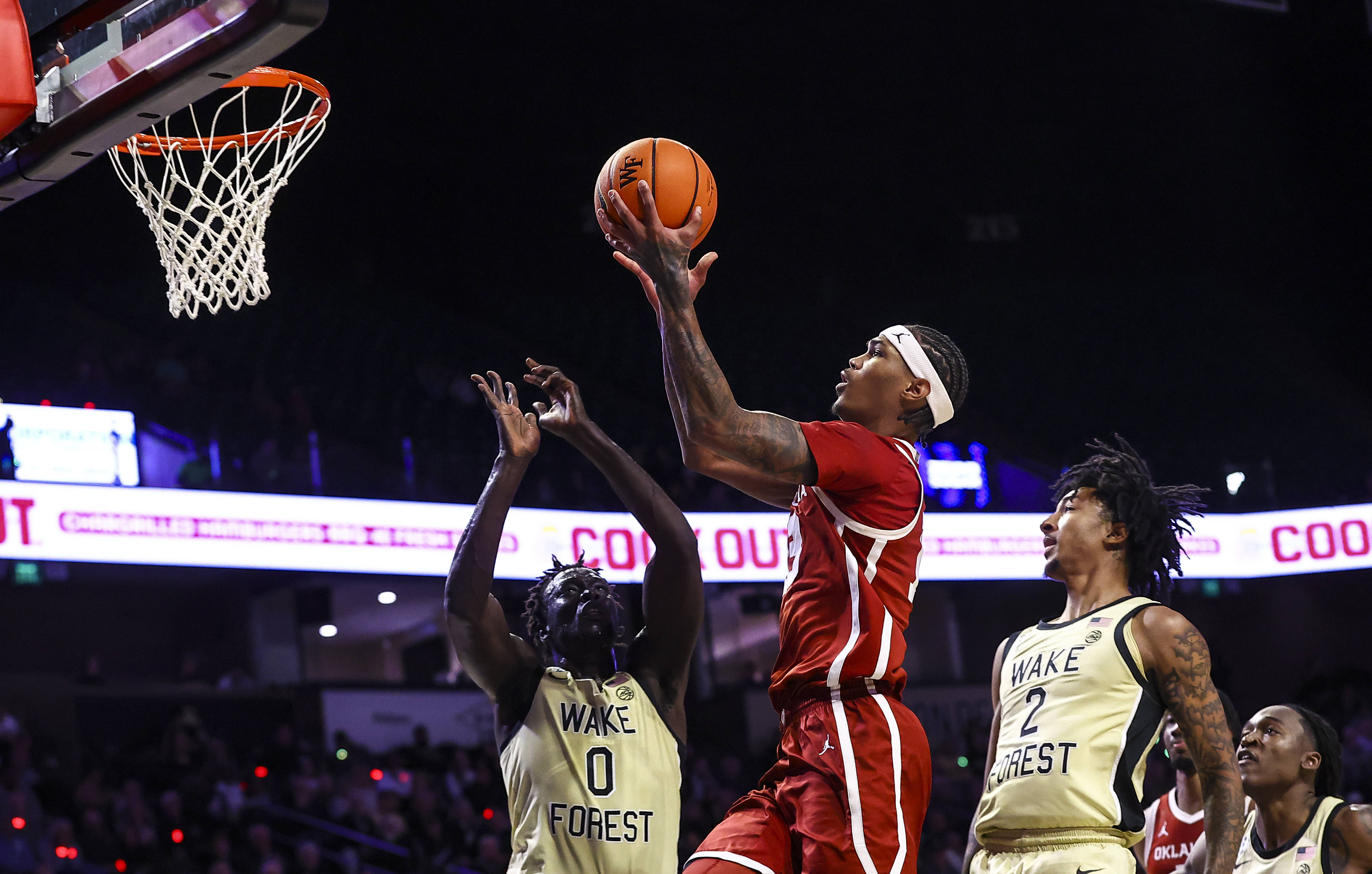 Tae Davis of Oklahoma Sooners goes in for layup