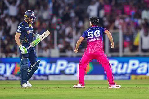 Ravi Bishnoi celebrates after dismissing Jos Buttler 