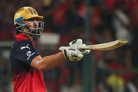 Tim David celebrates his half-century against Chennai Super Kings