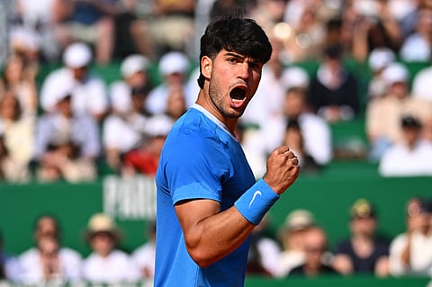 Carlos Alcaraz celebrates during the semi-final match