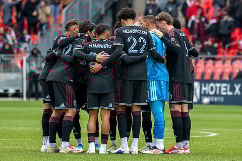 Colorado Rapids players huddle before a game