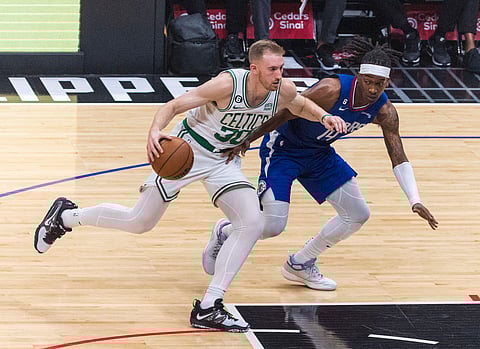 Sam Hauser of Boston Celtics with the ball