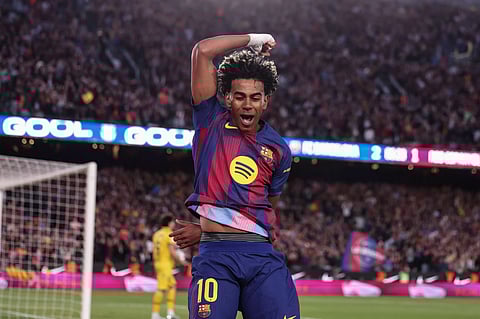 Lamine Yamal celebrates his goal against Espanyol