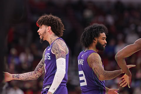 Coby White and LaMelo Ball in action