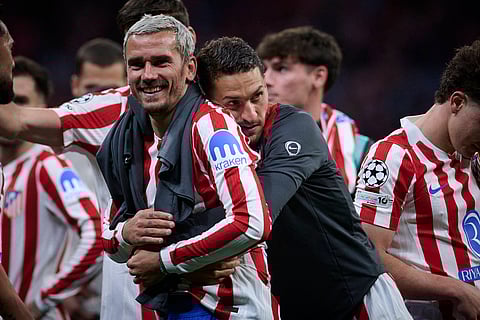 Antoine Griezmann celebrates at full-time