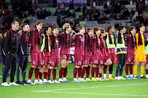 Vissel Kobe players lined up before a match