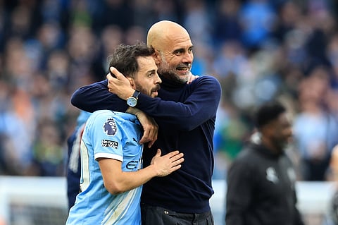 Pep Guardiola with captain Bernardo Silva at full-time