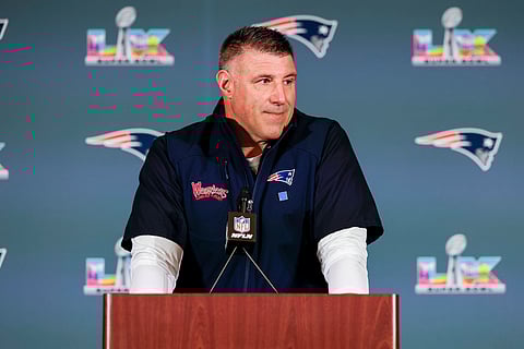 Mike Vrabel talks to the media