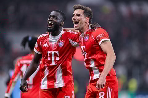 Dayot Upamecano and Leon Goretzka celebrate win over Bayer Leverkusen